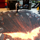 Illustration for article titled Dark Knight art appears to rip the floor out of an Australian mall
